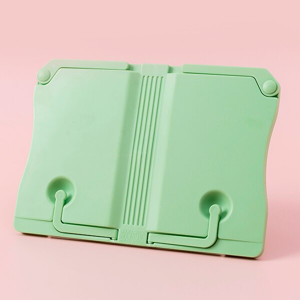 Groene plastic boekenstandaard